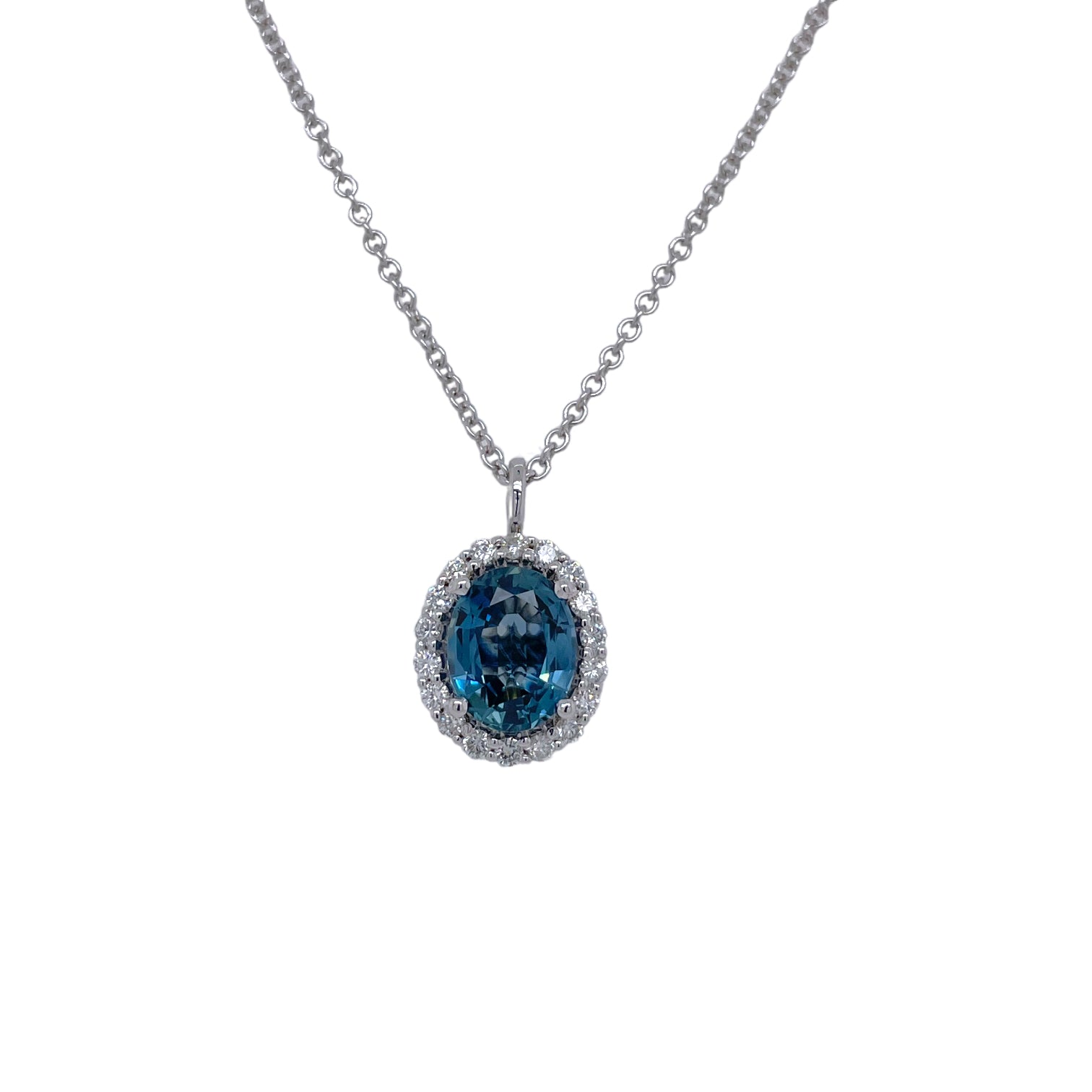 Oval Teal Blue Sapphire & Diamond Halo Pendant in White Gold