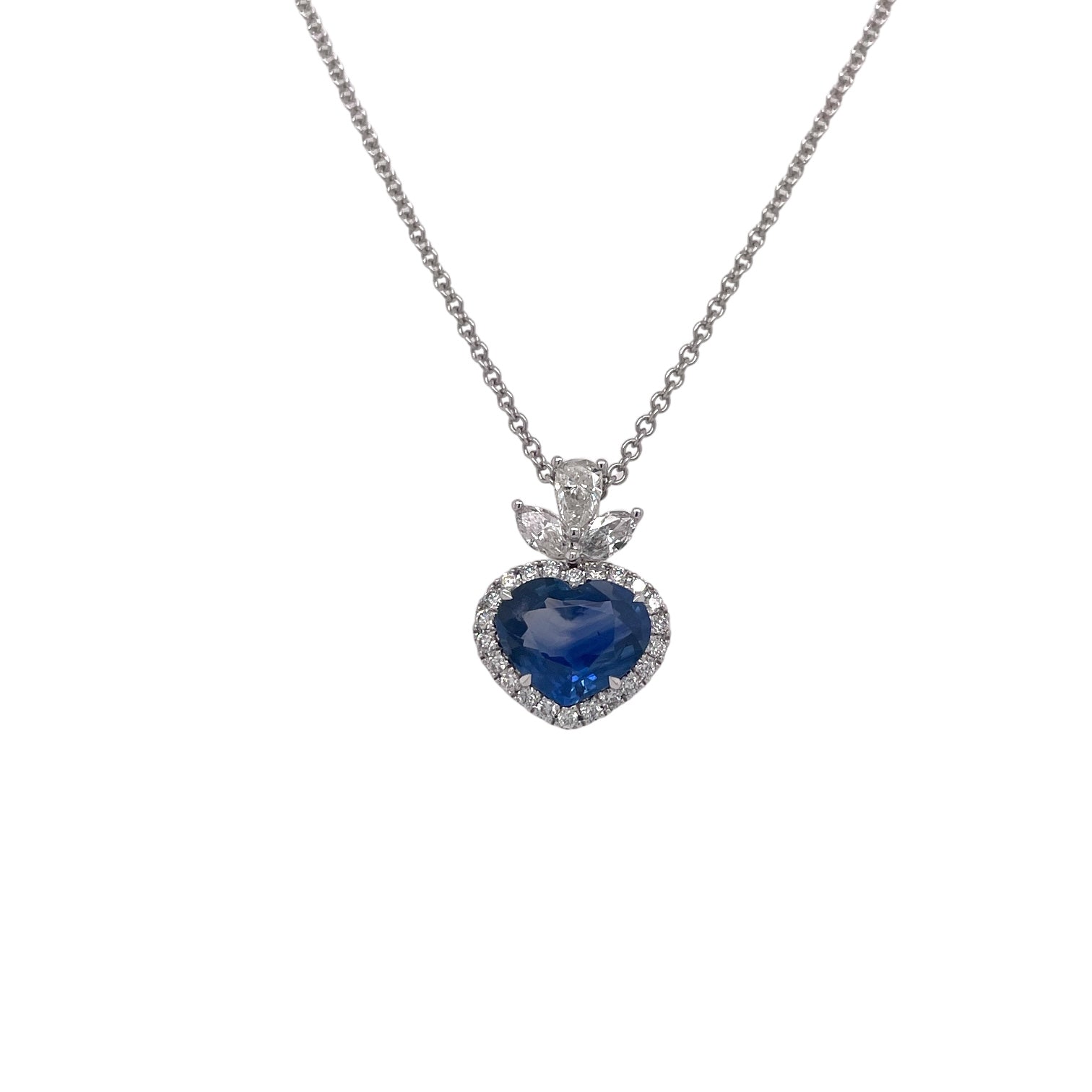 Heart Shape Sapphire & Diamond Halo Pendant in White Gold