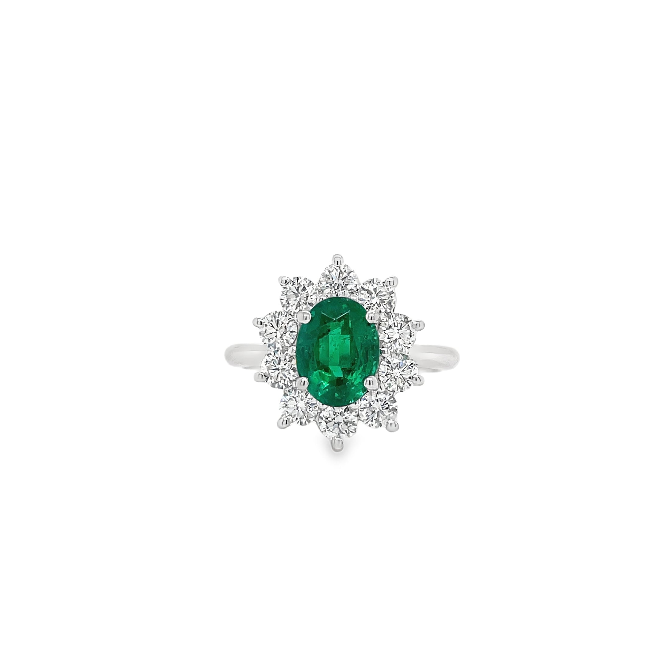 Oval Emerald & Diamond Halo Ring in White Gold