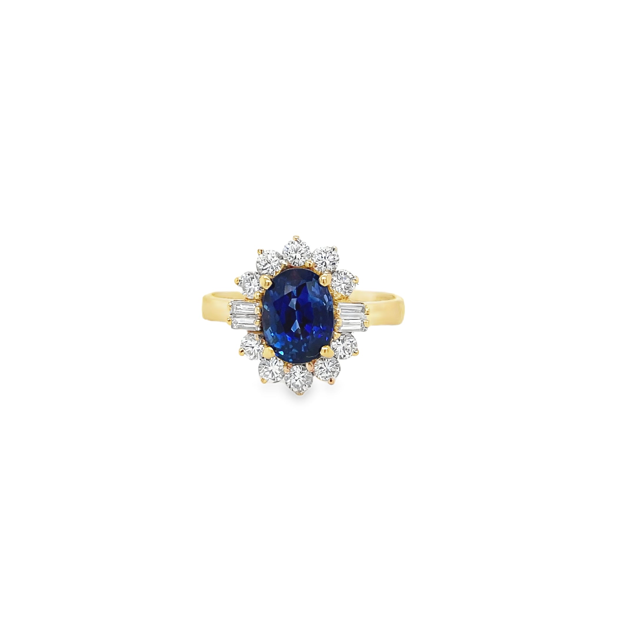 Oval Sapphire & Diamond Halo Ring in Yellow Gold