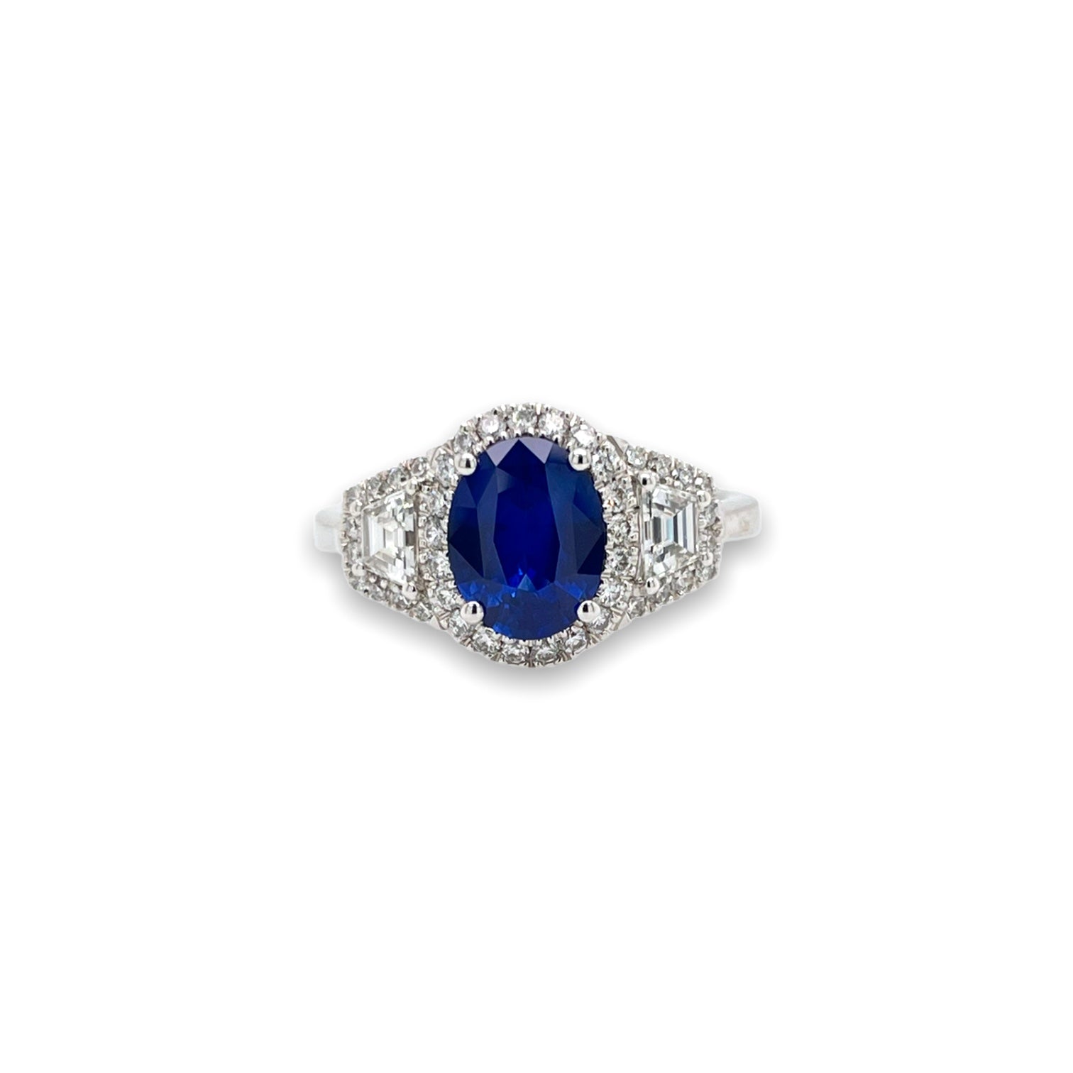 Oval Sapphire & Diamond Three Stone Halo Ring