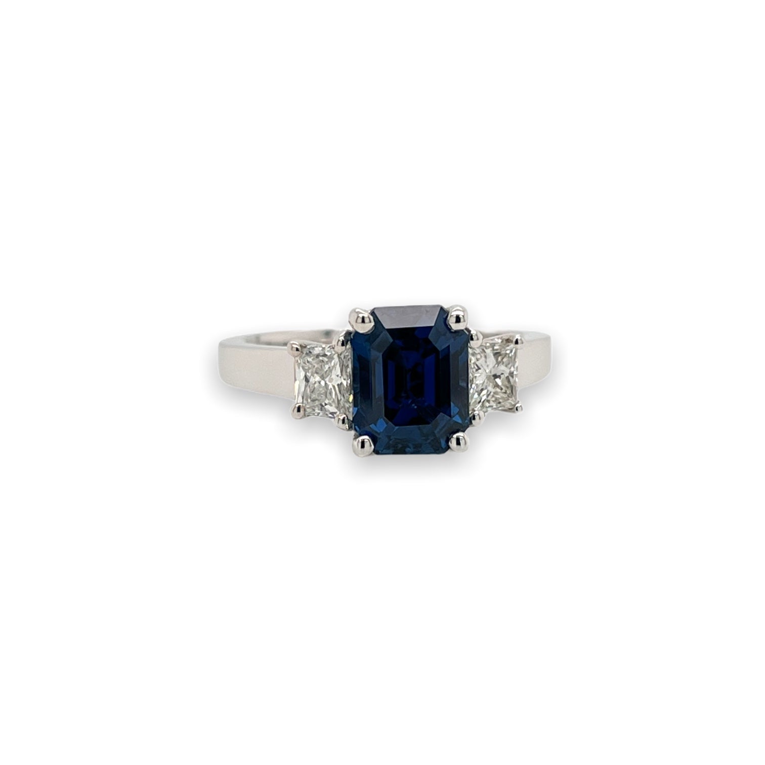 Emerald Cut Sapphire & Trapezoid Diamond Three Stone Ring